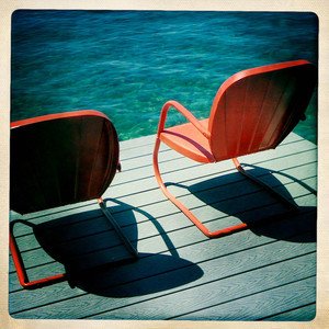 lounging on red chairs lounging on red chairs