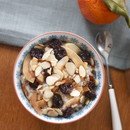 warm farro cereal with coconut, cherries, and almonds