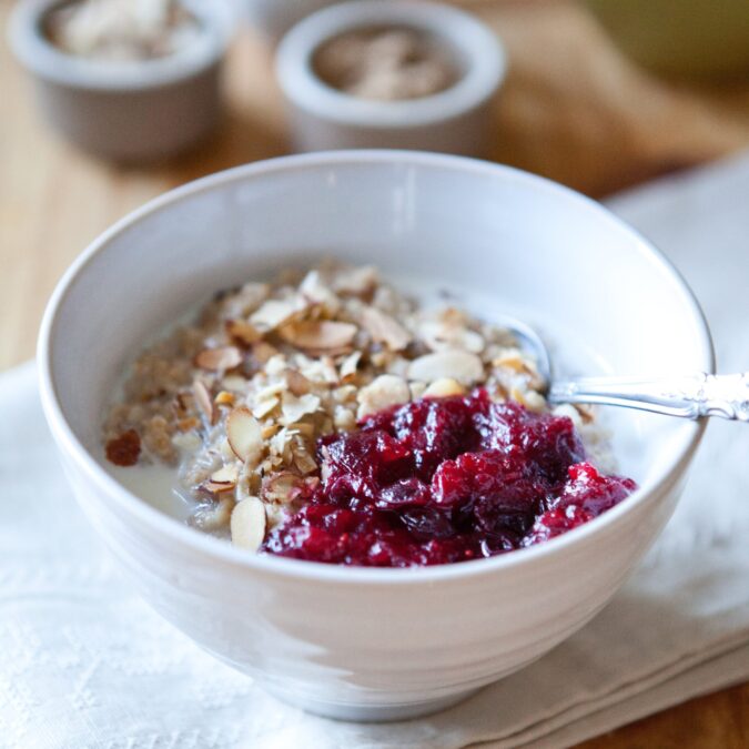 Spiced Steel Cut Oats Porridge with Cranberry-Ginger Sauce